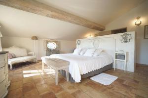 Postel nebo postele na pokoji v ubytování Mas aux gourmandises