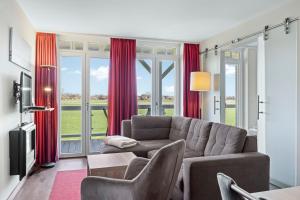 Posezení v ubytování Resort Deichgraf Resort Deichgraf 31-08