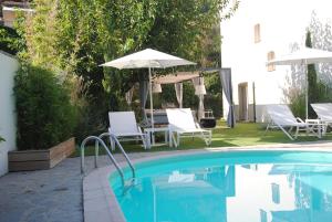 Swimmingpoolen hos eller tæt på Villa 12 couchages avec piscine