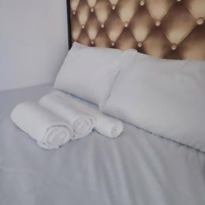 En eller flere senge i et værelse på Loft apartments