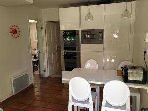 Køkken eller tekøkken på Villa 12 couchages avec piscine