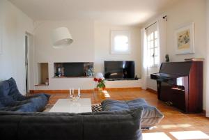 Et opholdsområde på Villa 12 couchages avec piscine