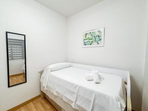 Postel nebo postele na pokoji v ubytování Expoholidays-Federico Garcia Lorca