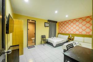 Postel nebo postele na pokoji v ubytování Hotel Juliano