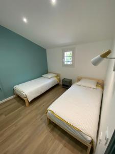 En eller flere senge i et værelse på Maison Aix-en-Provence