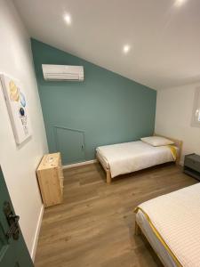 En eller flere senge i et værelse på Maison Aix-en-Provence