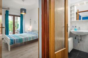 Postel nebo postele na pokoji v ubytování Ohana Lodge