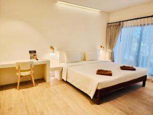Cama ou camas em um quarto em Twin Bay Resort Koh Lanta