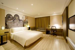 Postel nebo postele na pokoji v ubytování Atour Hotel Guangzhou Yueqiao Branch