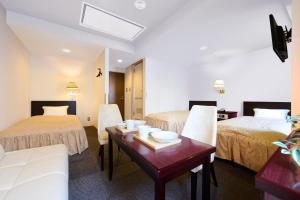 Una cama o camas en una habitación de Hotel Sho Sapporo - Vacation STAY 61187v