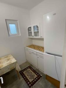Kuchyňa alebo kuchynka v ubytovaní Holiday home Fonyod 10