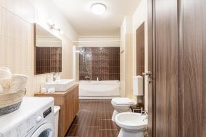 Koupelna v ubytování ARI RED Apartment in Ared Kaufland Resort + 24 fotografií