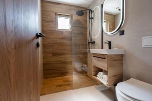 a bathroom with a shower with a sink and a toilet at Villa Piccolotti in Neum +43 photos