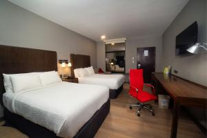 Postel nebo postele na pokoji v ubytování Four Points by Sheraton Saltillo