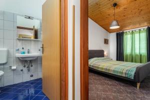Koupelna v ubytování Ohana Lodge