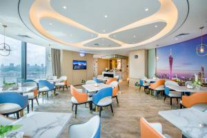 TV a/nebo společenská místnost v ubytování Atour Hotel Guangzhou Yueqiao Branch
