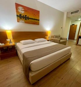 Letto o letti in una camera di Caesar Hotel Ramallah