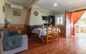 a living room with a table and a couch at Olvera in Olvera