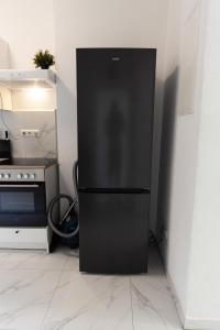 Η κουζίνα ή μικρή κουζίνα στο Nord-Apartment 7 I 2 Zimmer mit Regendusche, Bettwäsche & WLAN
