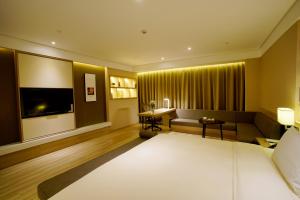 Postel nebo postele na pokoji v ubytování Atour Hotel Guangzhou Yueqiao Branch