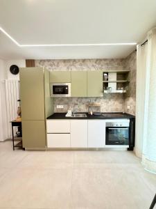 Η κουζίνα ή μικρή κουζίνα στο NEM Tiny House by Pleiades Home