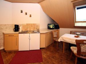 Kuchyň nebo kuchyňský kout v ubytování Apartments Spreewaldperle, Alt Zauche