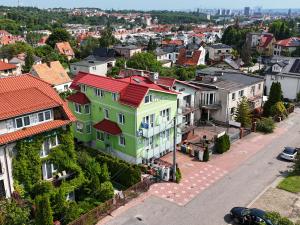 an aerial view of a city with houses at AbWentur Pokoje in Gdańsk