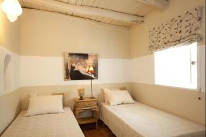 Ένα ή περισσότερα κρεβάτια σε δωμάτιο στο Finca with Pool Santa Eularia