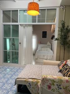 Postel nebo postele na pokoji v ubytování DADDYs ON Home Muang Lopburi