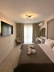 Ένα ή περισσότερα κρεβάτια σε δωμάτιο στο 27 Urban Stay +3 φωτογραφίες