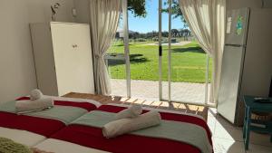 Katil atau katil-katil dalam bilik di Uurpan Lodge +105 gambar