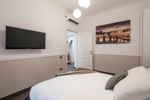 Posteľ alebo postele v izbe v ubytovaní The Best Rent - Apartment in Testaccio district