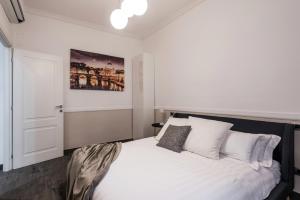 Posteľ alebo postele v izbe v ubytovaní The Best Rent - Apartment in Testaccio district