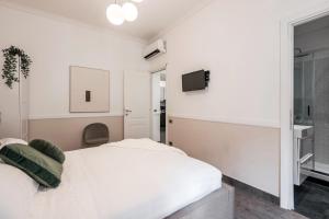 Posteľ alebo postele v izbe v ubytovaní The Best Rent - Apartment in Testaccio district