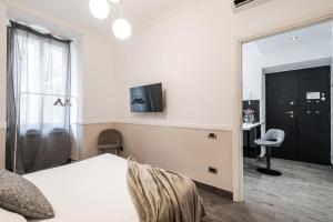 Televízia a/alebo spoločenská miestnosť v ubytovaní The Best Rent - Apartment in Testaccio district