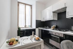 Kuchyňa alebo kuchynka v ubytovaní The Best Rent - Apartment in Testaccio district