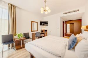 Voodi või voodid majutusasutuse Hotel ANTARES toas