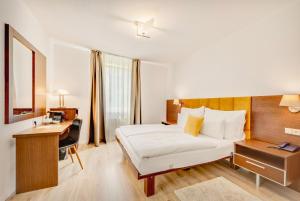 Voodi või voodid majutusasutuse Hotel ANTARES toas
