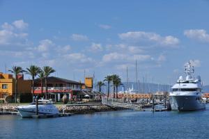 a couple of boats docked in a harbor at NH Marina Portimao Resort in Portimão