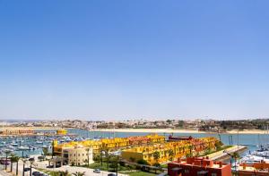 a view of a harbor with boats in the water at NH Marina Portimao Resort in Portimão