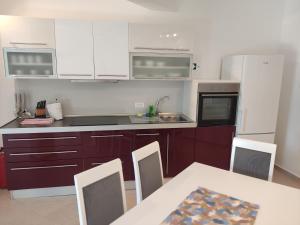 Η κουζίνα ή μικρή κουζίνα στο Apartmani Kula