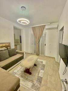 TV a/nebo společenská místnost v ubytování Apartments Lobby