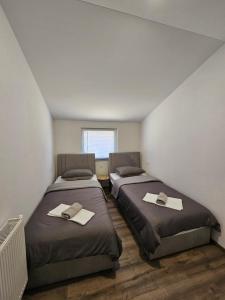 Postel nebo postele na pokoji v ubytování Apartman Ivan