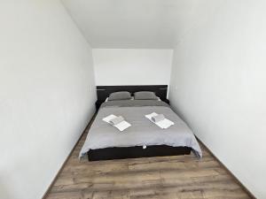 Postel nebo postele na pokoji v ubytování Apartman Ivan