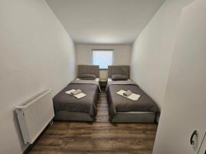 Postel nebo postele na pokoji v ubytování Apartman Ivan
