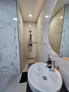 Koupelna v ubytování Apartman Ivan + 37 fotografií