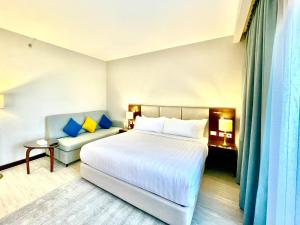 Postel nebo postele na pokoji v ubytování Porto Sokhna Beach Resort