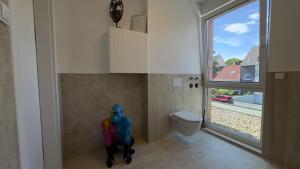 Ένα μπάνιο στο Luxuriöse Wohlfühloase im Neusser Stadionviertel - BLNM APARTMENTS +50 φωτογραφίες