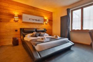 Postel nebo postele na pokoji v ubytování Hotel Valle Pesio Ristorante