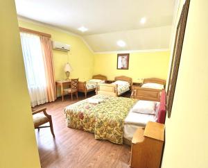 Letto o letti in una camera di Hotel Lileo